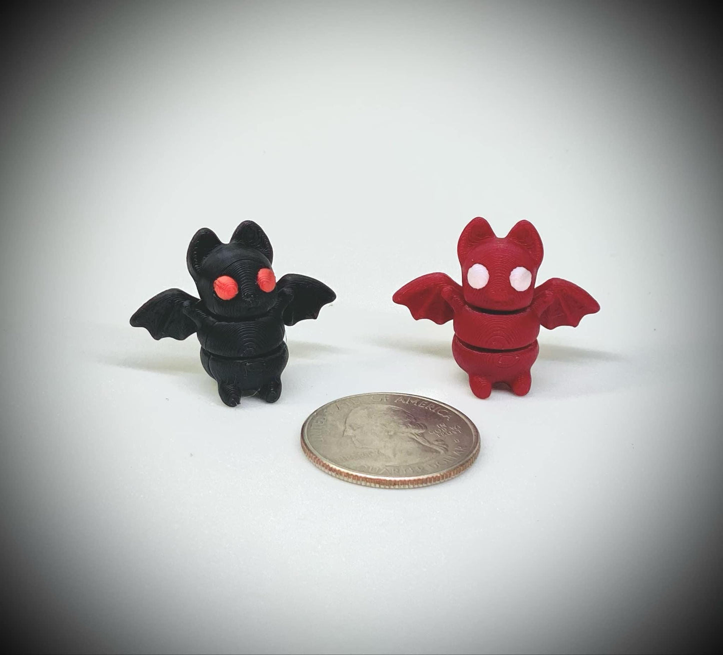 3d printed tiny articulated creatures, designed by Zou. Box of random minis.